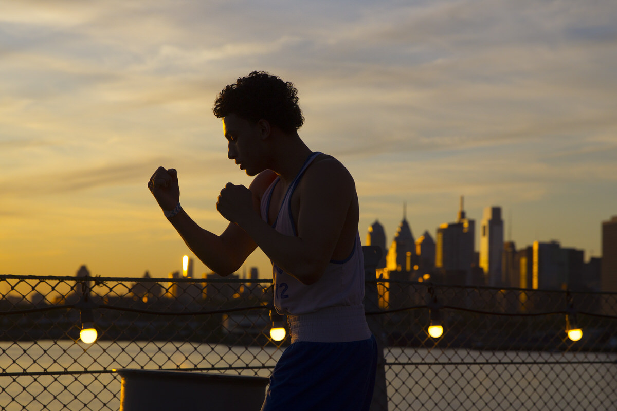 Dominic Bevins of Philadelphia warms up aboard the Battleship New Jersey for an amateur boxing event to raise funds for a statue of Camden boxing legend Jersey Joe Walcott.